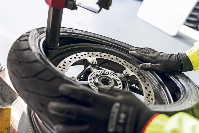 Close-up of a new motorcycle tyre ready for fitting